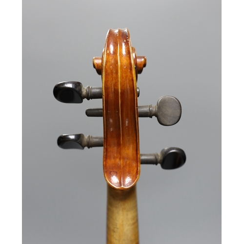 431 - An early 20th century cased violin, length of back 36 cm