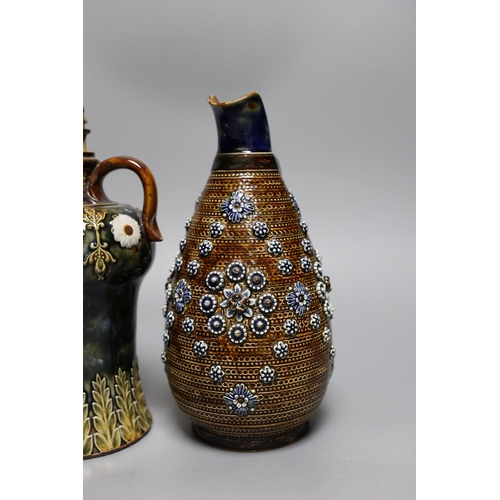 438 - A Doulton Lambeth stoneware decanter and a similar jug, dated 1877, jug 24cms high,