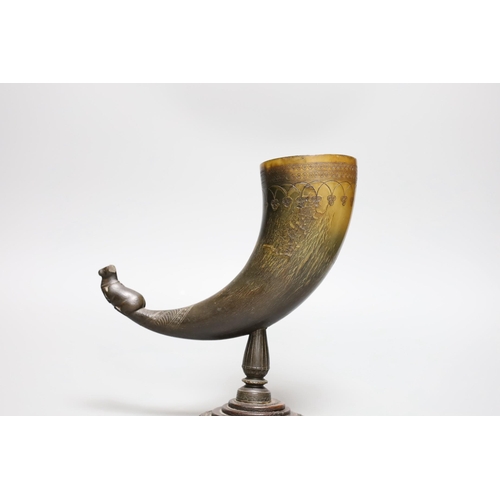 441 - A Persian horn rhyton, 19th century or earlier, with horn stem and stepped wood base, 21cms high, 20... 