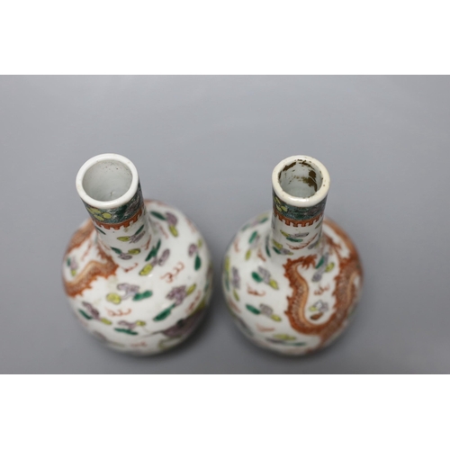 457 - A pair of Chinese enamelled porcelain dragon bottle vases, Kangxi marks probably Guangxu period, 1... 