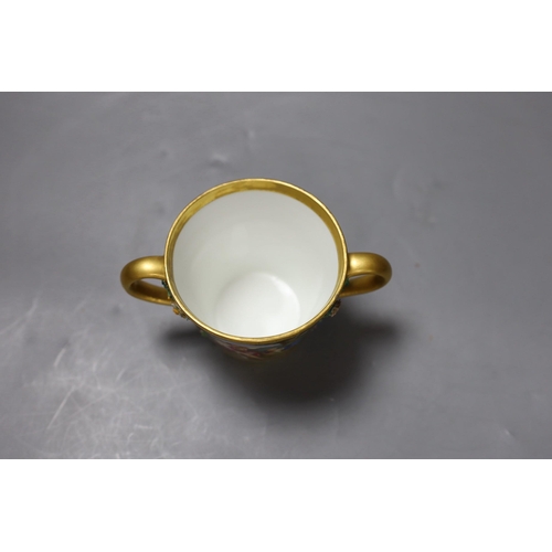 463 - A Vienna style two handled porcelain chocolate cup and cover, c.1900, 13cms high,