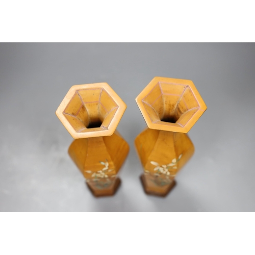 467 - A pair of Chinese bamboo veener vases, on stands,20cm high,