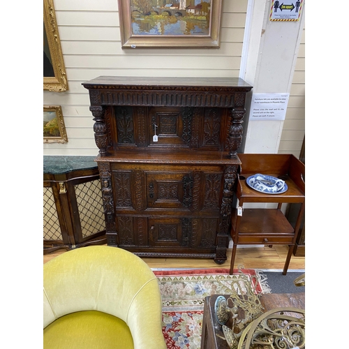 48 - A 17th century carved oak press cupboard, width 112cm, depth 51cm, height 159cm