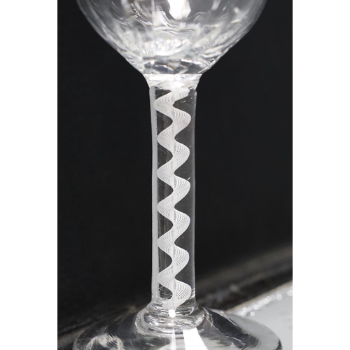 490 - An opaque airtwist stem goblet, 18th century,19cms high,