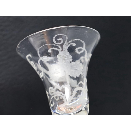 491 - An 18th century wheel engraved balustrade fluted glass, 15cm tall