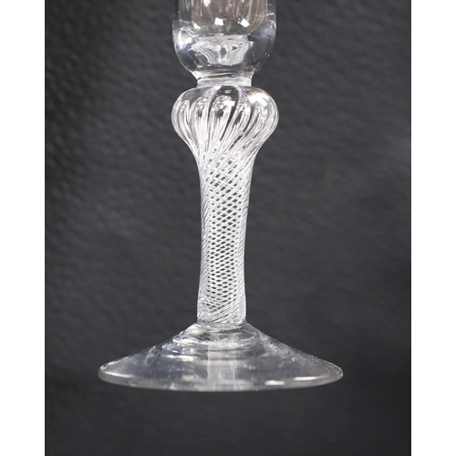 496 - A knopped air twist stem fluted glass, 18th century, 15.5cm tall