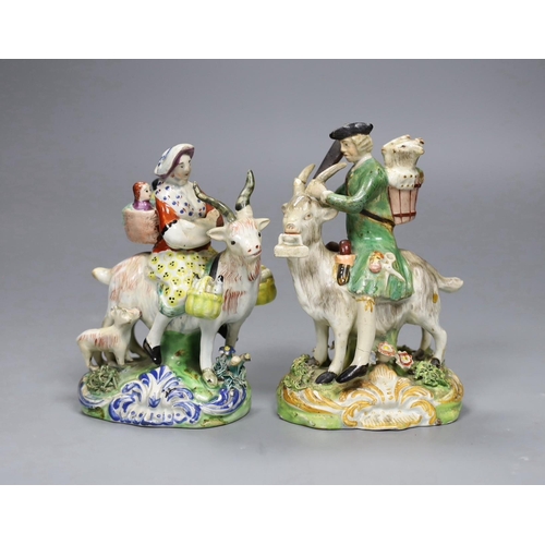 499 - A near pair of pearlware groups Tailor and his wife, c.1820, tallest 13.5cm