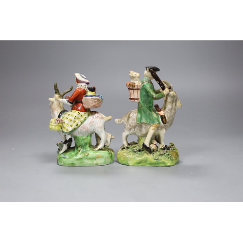 499 - A near pair of pearlware groups Tailor and his wife, c.1820, tallest 13.5cm