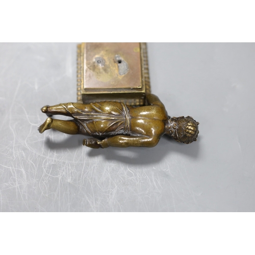 517 - A 19th century Grand Tour souvenir bronze figure a Bacchanlian putti, 9cms high,