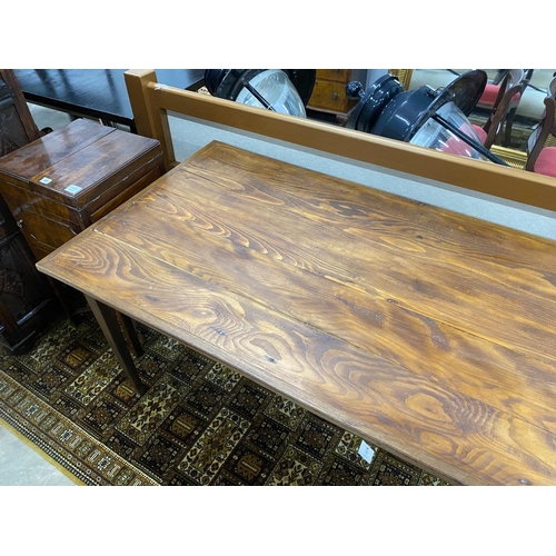 52 - A rectangular French style oak kitchen table from a factory in France, length 204cm, depth 85cm, hei... 