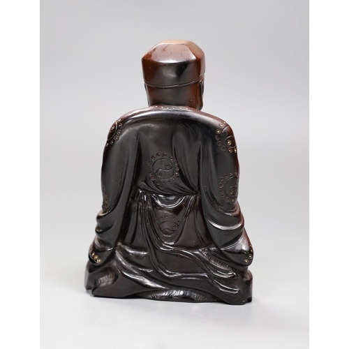 520 - A Chinese composition figure of a seated musician, 12cms high,