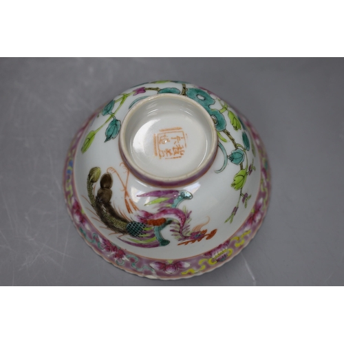 523 - A Chinese Straits famille rose bowl, late 19th century,13.5cms diameter,