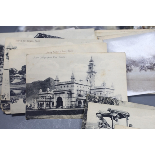 528 - Carte du Viste and Edwardian and later postcards including India, British army etc.