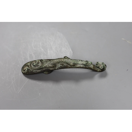 531 - A Chinese Song dynasty or later bronze belt hook,13.5cms long,