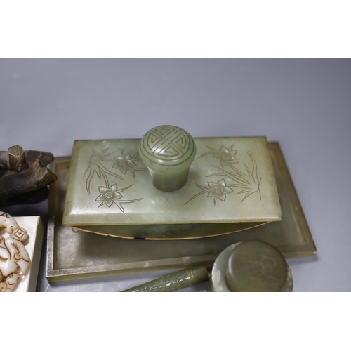 536 - A Chinese bowenite jade desk set (7) and a plaque,model of junk 16cms high,