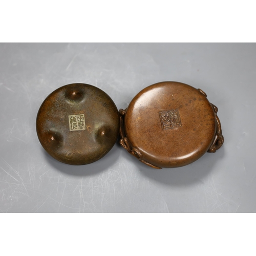 542 - Two Chinese bronze censers,  largest 11cms diameter,