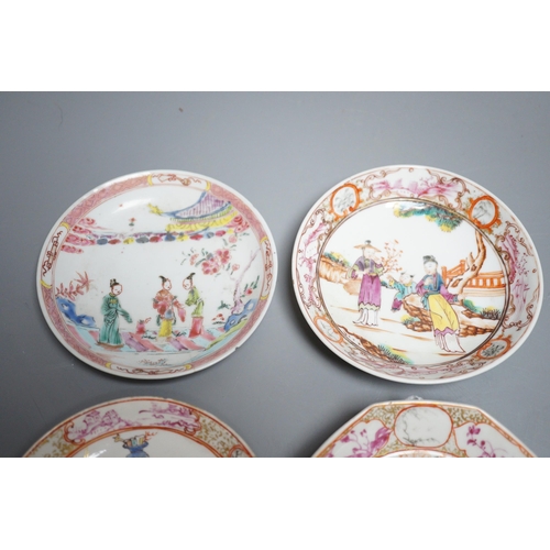 559 - A group of four 18th century Chinese export famille rose saucers,