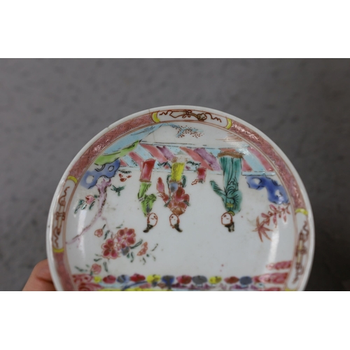 559 - A group of four 18th century Chinese export famille rose saucers,