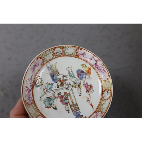 559 - A group of four 18th century Chinese export famille rose saucers,