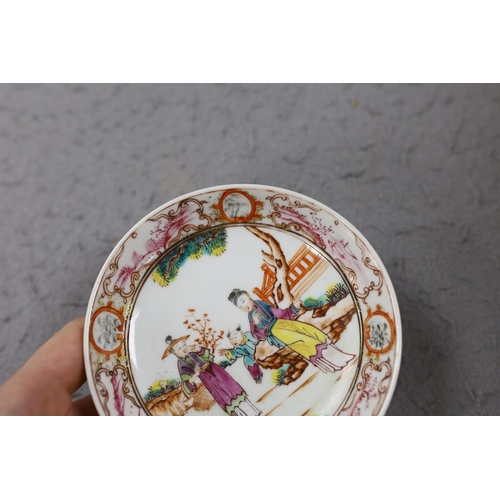 559 - A group of four 18th century Chinese export famille rose saucers,