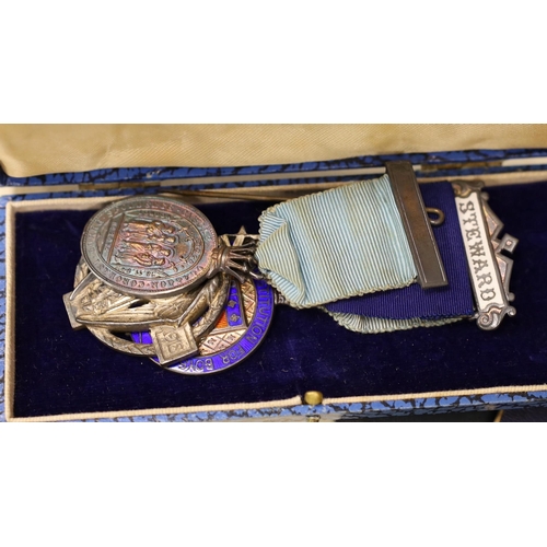 561 - A collection of Masonic medals, cuffs and ephemera anda W Masjid-1, Suleman Lodge Banquet menu autog... 