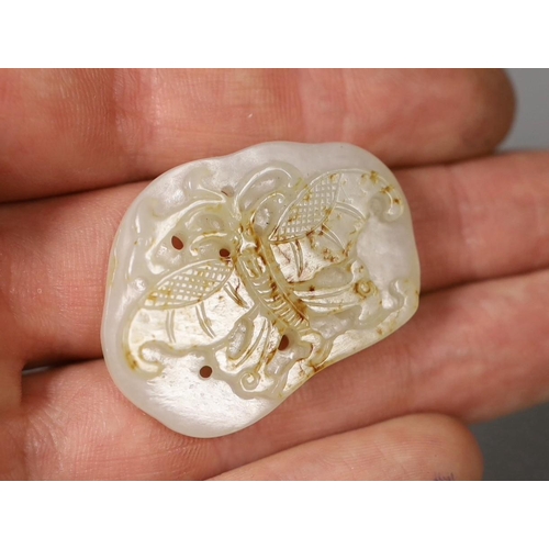 566 - A Chinese white and russet skin jade butterfly plaque,3,5 cms long