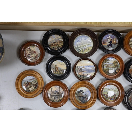 569 - A collection of 19th century Prattware pot lids (23)