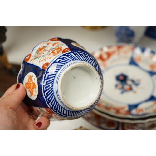 582 - A group of Japanese ceramics to include Imari dishes a Seto ware blue and white vase etc. tallest 30... 