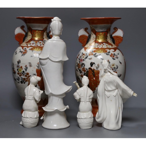 583 - 4 Chinese blanc-de-chine figures, a Chinese puce enamelled vase and a pair of Japanese Kutani vases,... 