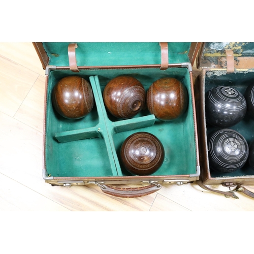 586 - A set of four Slazengers bowls balls and another set of four Douglas Kenn ltd. Henselite bowls bal... 