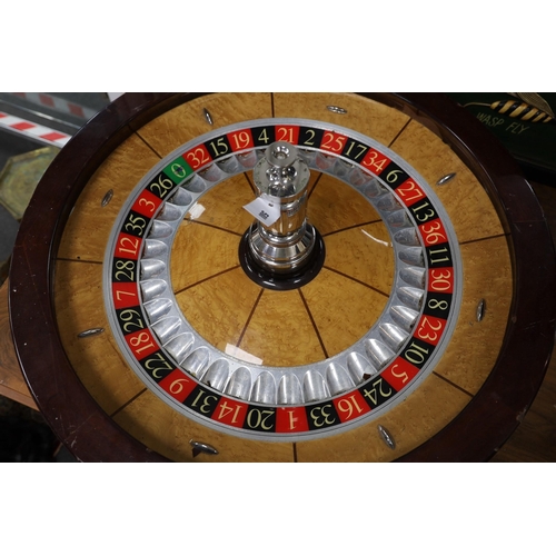 588 - A wood and chrome Technical Casino Supplies roulette wheel, 80 cm diameter, please note this is exce... 