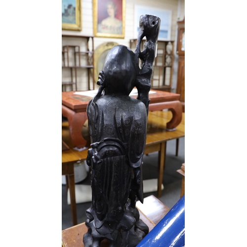 595 - A large Chinese hardwood figure of Shou Lao, first half 20th century, 82cm tall