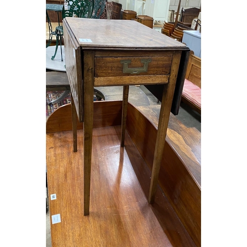 67 - An early 19th century mahogany drop flap occasional table, width 50cm, depth 34cm, height 69cm... 