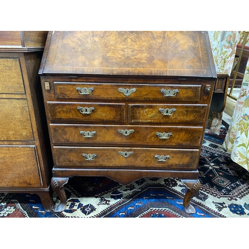 69 - A Queen Anne revival feather banded walnut bureau, width 76cm, depth 50cm, height 101cm