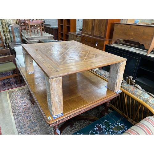 73 - A rectangular parquetry coffee table, width 115cm, depth 89cm, height 40cm