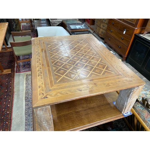 73 - A rectangular parquetry coffee table, width 115cm, depth 89cm, height 40cm