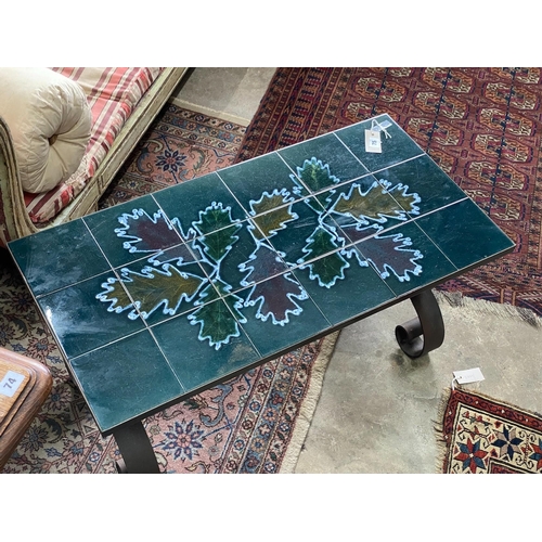 75 - A 1970's wrought iron tile top coffee table, length 90cm, depth 45m, height 42cm