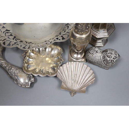 804 - Mixed silver and white metal items including two silver casters, a silver mounted hand mirror, an Eg... 