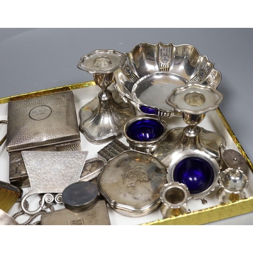 807 - Assorted silver including a pierced bowl, pair of dwarf candlesticks, four condiments(a.f.), cigaret... 