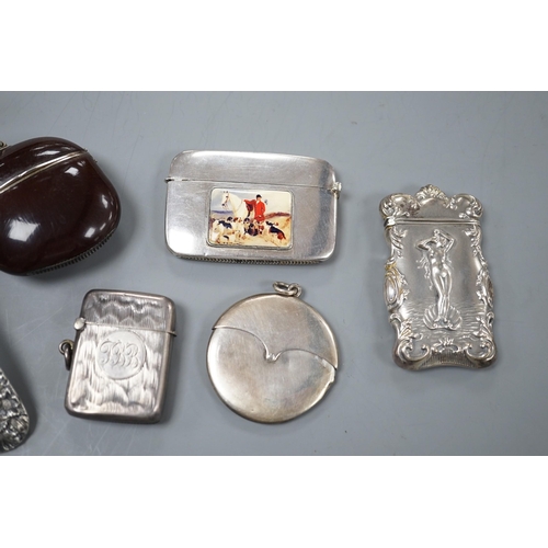 809 - Four assorted early 20th century silver vesta cases, including a silver gilt mounted nut, and patent... 