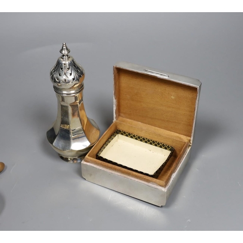 814 - A George V engine turned silver mounted cigarette box, a similar sugar caster and later silver tea s... 