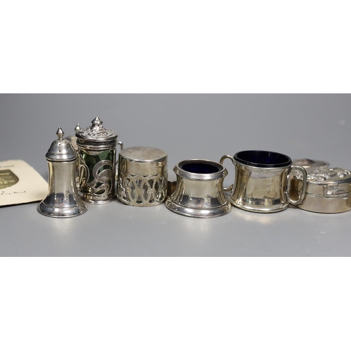 824 - A small group of collectable small silver and white metal items including two pairs of 19th century ... 