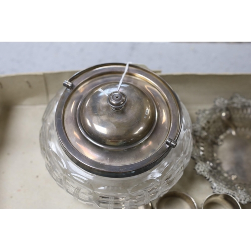 830 - A George V silver mounted glass bowl and cover and other sundry silver including napkin rings, vesta... 