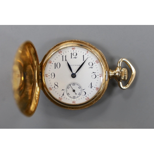 879 - An early 20th century engraved 14k Waltham keyless hunter fob watch, with Arabic dial and engraved i... 