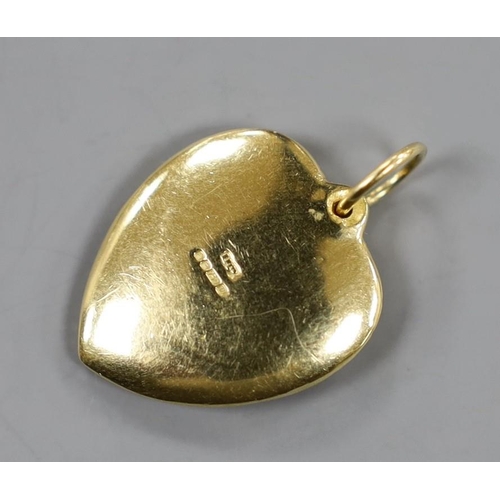 885 - A modern 18ct gold and pave set diamond heart shaped pendant, overall 27mm, gross weight 11.3 grams.... 