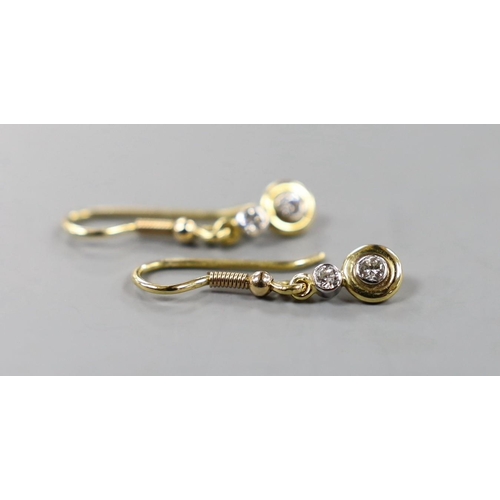 886 - A pair of yellow metal and two stone diamond set drop earrings, overall 25mm, gross weight 2.1 grams... 