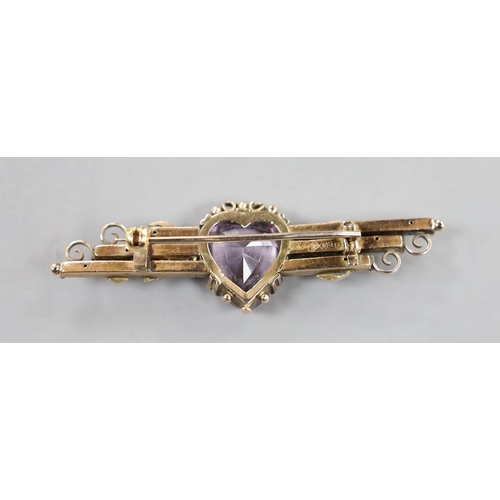 900 - An early 20th century 9ct gold, heart shaped amethyst and seed pearl set bar brooch, 59mm, gross wei... 