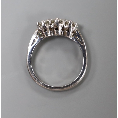 907 - A modern platinum and three stone diamond ring, size H, gross weight 4.8 grams.