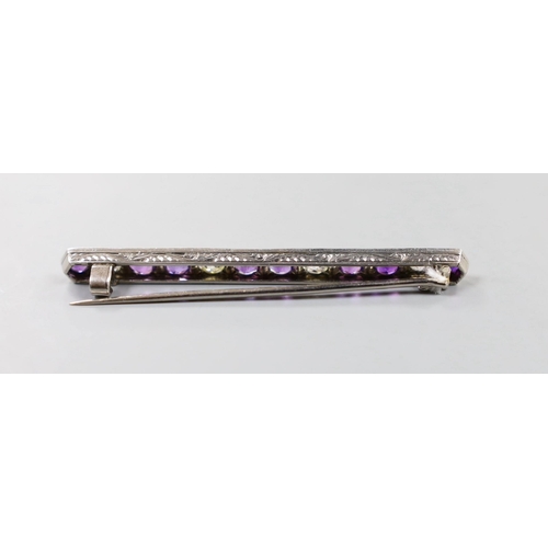 919 - A white metal, eight stone amethyst and four stone diamond set bar brooch, 57mm, gross weight 4.6 gr... 