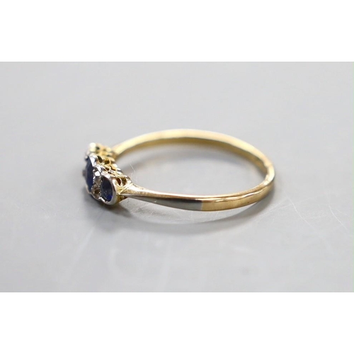 929 - A 1920's 18ct and plat, three stone sapphire and four stone diamond chip set ring, size O, gross wei... 